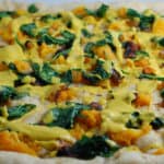 Butternut squash and spinach pizza with butternut cream sauce