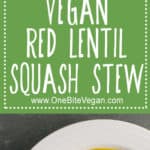 Vegan red lentil squash stew. Chunky lentil based stew packed with squash, spinach, carrots, and topped with pepitas.