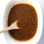 Chinese garlic sauce in a bowl with a spoon