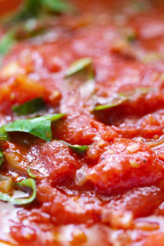 Close up shot of tomato basil sauce