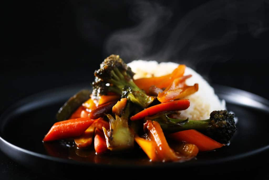 stir-fry sauce on veggies and rice
