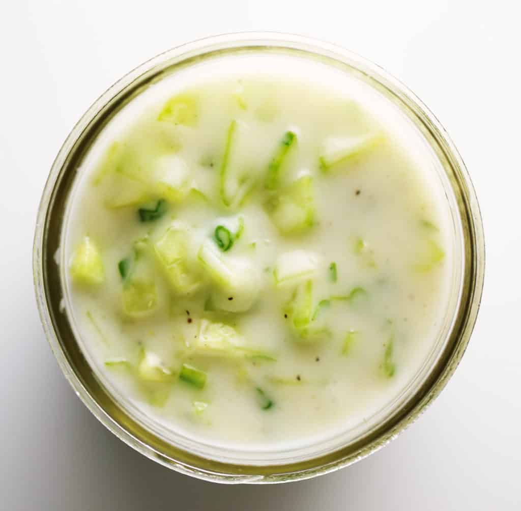 cucumber yogurt sauce in a mason jar