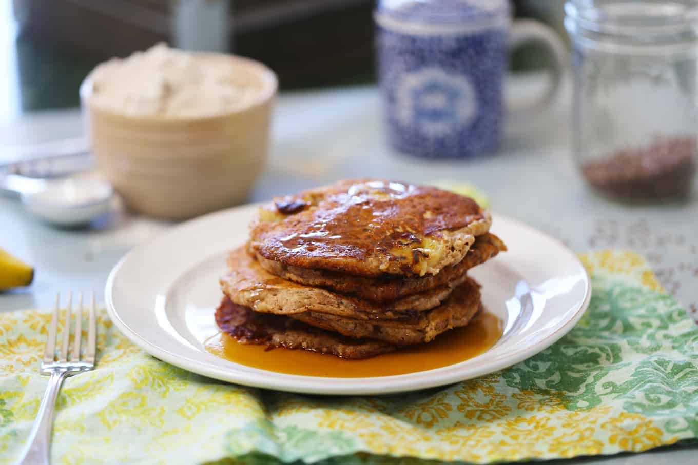 Easy Vegan Pancakes with bananas for Pancake day! Served up to you by One Bite Vegan!