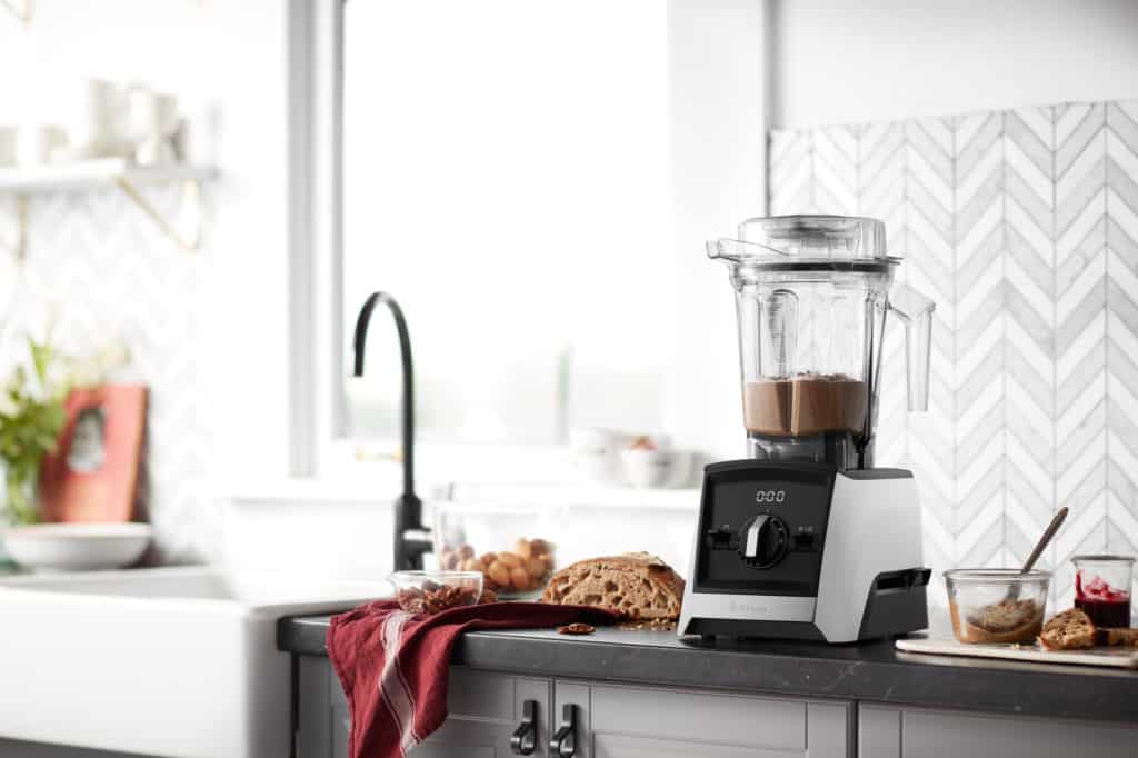 A picture of a Vitamix blender sitting on a kitchen worktop