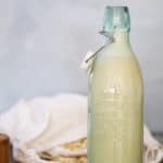 Homemade Oat Milk in a bottle.