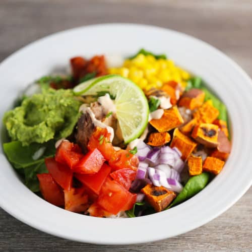 Refried Beans and Rice Bowl with Veggies and Smoky Cajun Sauce One