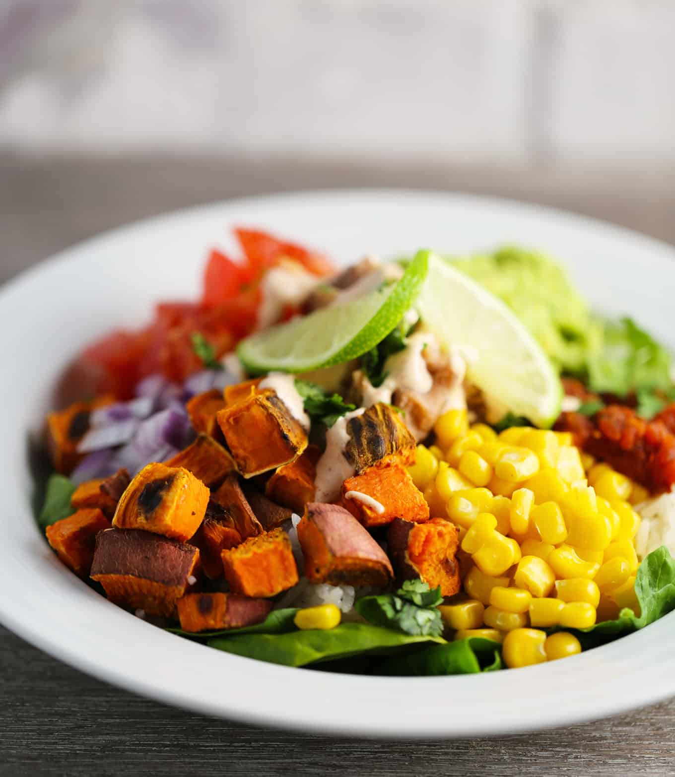 Refried Beans and Rice Bowl with Veggies and Smoky Cajun Sauce One